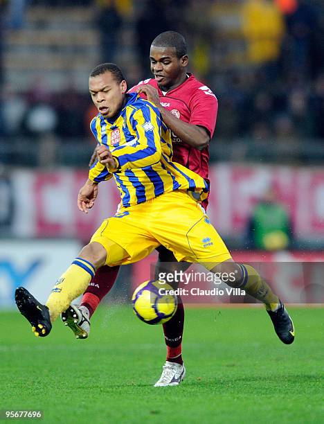 Jonathan Biabiany of Parma FC in action against Marcus Diniz of AS Livorno Calcio during the Serie A match between Livorno and Parma at Stadio...
