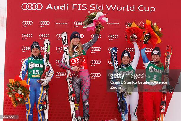 Lindsey Vonn of the USA takes 1st place, Anja Paerson of Sweden takes 2nd place, and Nadia Fanchini of Italy and Martina Schild of Switzerland take...