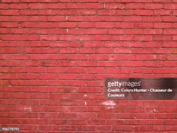 weathered red bricks wall - red wall stock pictures, royalty-free photos & images