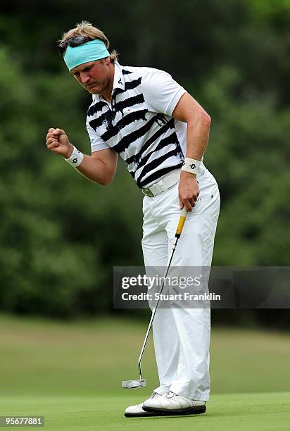 Pelle Edberg of Sweden celebrates his putt on the 17th hole during the final round of the Africa Open at the East London Golf Club on January 10,...