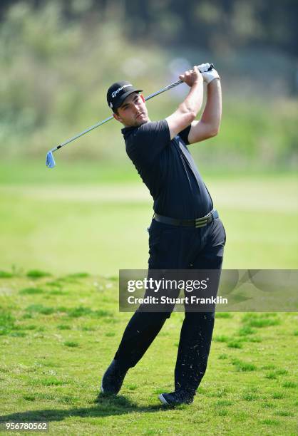 Bradley Neil of Scotland plays a shot from the light rough during day one of the Rocco Forte Open at Verdura Golf and Spa Resort on May 10, 2018 in...