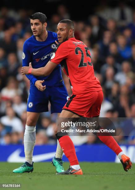 Mathias Jorgensen of Huddersfield Town tangles with Alvaro Morata of Chelsea during the Premier League match between Chelsea and Huddersfield Town at...