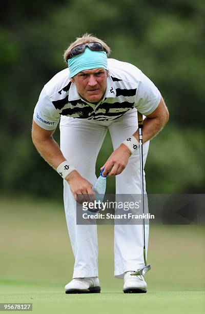 Pelle Edberg of Sweden lines up his putt on the 17th hole during the final round of the Africa Open at the East London Golf Club on January 10, 2010...