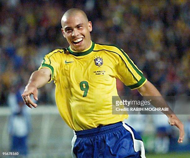 Brazilian forward Ronaldo jubilates after scoring a goal, 27 June at the Parc des Princes stadium in Paris, during the 1998 Soccer World Cup second...