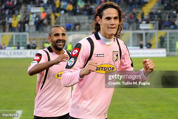 Edinson Cavani and his team-mate Fabio Liverani celebrate the opening goal during the Serie A match between US Citta di Palermo and Atalanta BC at...