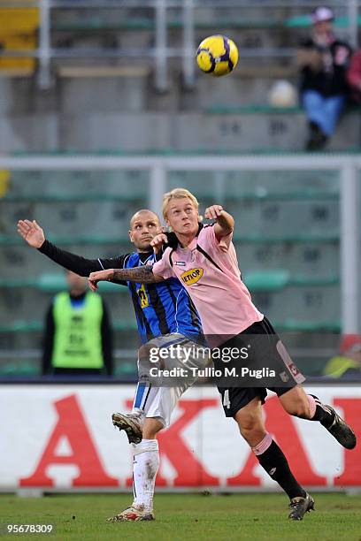 Simone Tiribocchi of Atalanta and Simon Kjaer of Palermo compete for a header during the Serie A match between US Citta di Palermo and Atalanta BC at...