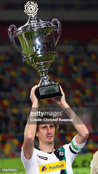 Roel Brouwers holds the winning trophee after winning 1-0 the Wintercup final match between Fortuna Duesseldorf and Borussia Moenchengladbach at the...