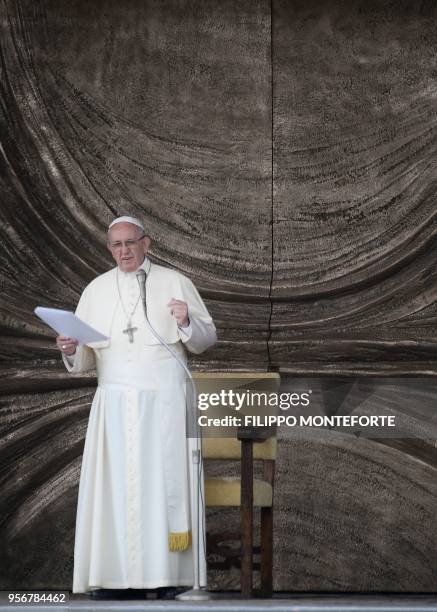Pope Francis addresses the crowd on the parvis of the Mary Theotokos Shrine during a pastoral visit in Loppiano, on May 10, 2018 near Grosseto,...