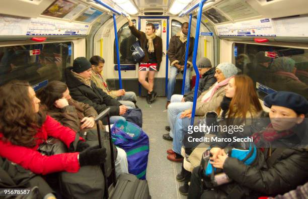 Members of the public travelling on the London underground take part in "No Trousers on the Tube" on January 10, 2010 in London, England. 'No...