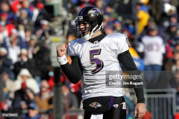 Joe Flacco of the Baltimore Ravens reacts after Ray Rice scored a 1-yard touchdown in the first quarter against the New England Patriots during the...