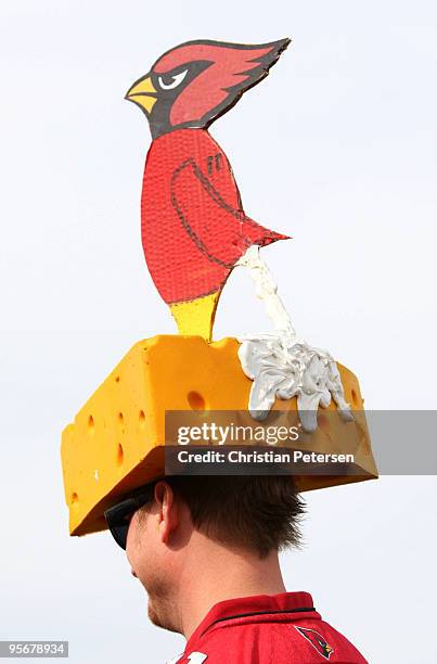 An Arizona Cardinals fan wears a hat in support of his team before the game against the Green Bay Packers at University of Phoenix Stadium on January...