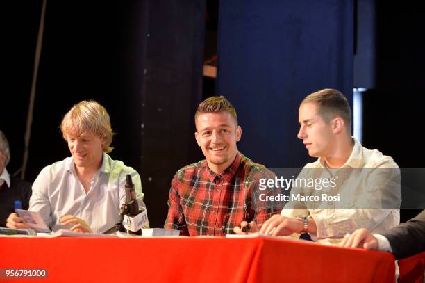 Dusan Basta, Sergej Milinkvoic Savic and Adam Marusic of SS Lazio meet students during a visit to Asisium school on May 10, 2018 in Rome, Italy.