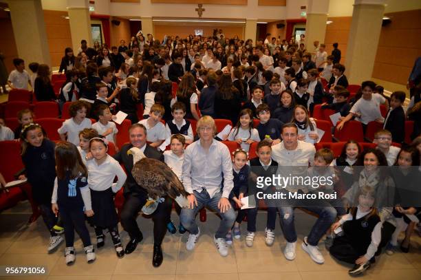 Dusan Basta and Adam Marusic of SS Lazio meet students during a visit to Asisium school on May 10, 2018 in Rome, Italy.