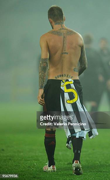 David Beckham of AC Milan leaves the field with the mesh of Fabio Cannavaro after the Serie A match between Juventus FC and AC Milan at Stadio...