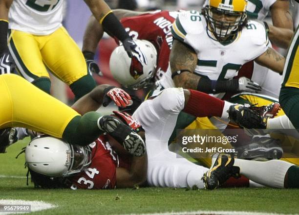 Running back Tim Hightower of the Arizona Cardinals scores a touchdown against the Green Bay Packers during the first quarter of the 2010 NFC...