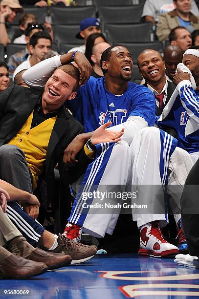 Blake Griffin and DeAndre Jordan of the Los Angeles Clippers have a fun moment on the bench during the game against the Miami Heat on January 10,...