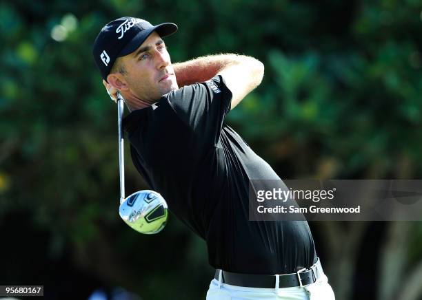 Geoff Ogilvy of Australia plays a shot during the final round of the SBS Championship at the Plantation course on January 10, 2010 in Kapalua, Maui,...