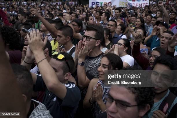 Supporters shout slogans as Gustavo Petro, presidential candidate for the Progressivists Movement Party, holds a campaign rally in Pereira, Colombia,...