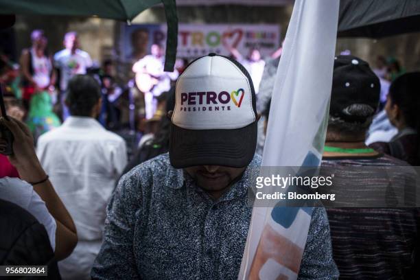 Supporter wears a campaign cap as Gustavo Petro, presidential candidate for the Progressivists Movement Party, holds a rally in Pereira, Colombia, on...
