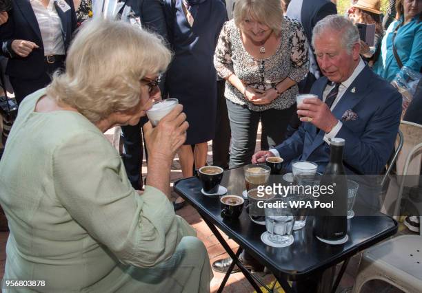 Camilla, Duchess of Cornwall and Prince Charles, Prince of Wales visit a café as they take a brief walking tour of the Kapnikarea Area of central...