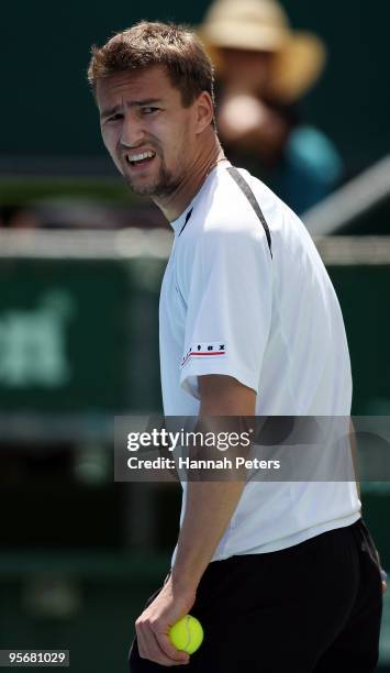 Marco Chiudinelli of Switzerland looks over to his coach during his first round match against Thomaz Bellucci of Brazil at ASB Tennis Centre on...