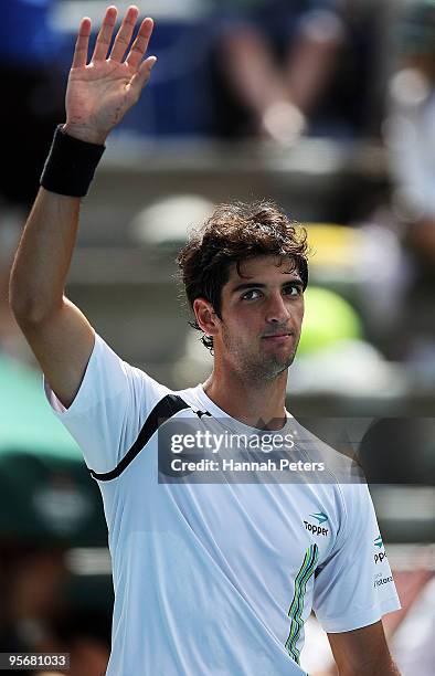 Thomaz Bellucci of Brazil thanks the crowd after winning his first round match against Marco Chiudinelli of Switzerland at ASB Tennis Centre on...