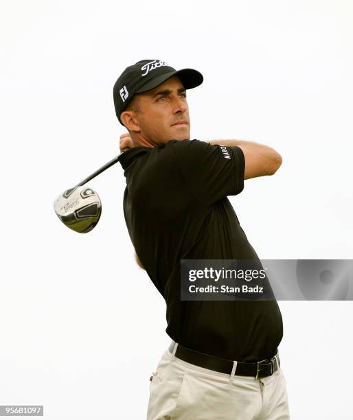 Geoff Ogilvy hits a drive off the 15th tee box during the final round of the SBS Championship at Plantation Course at Kapalua on January 10, 2010 in...