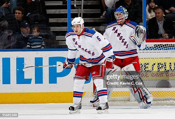 Daniel Girardi and goaltender Chad Johnson of the New York Rangers against the Atlanta Thrashers at Philips Arena on January 7, 2010 in Atlanta,...