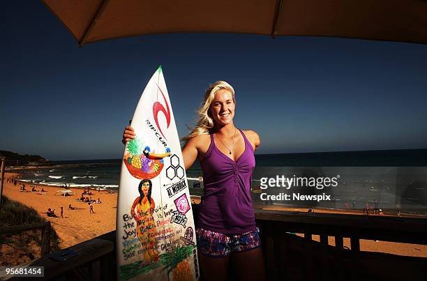Bethany Hamilton of Hawaii, who lost her arm in a shark attack when aged 13, poses at North Narabeen Beach on January 10, 2010 in Sydney, Australia.