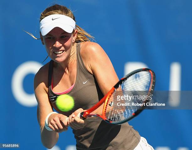 Olivia Rogowska of Australia plays a backhand during her first round match against Shahar Peer of Israel during day four of the Moorilla Hobart...