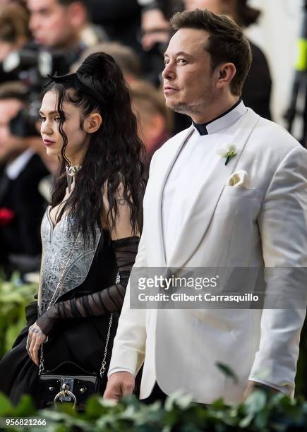 Elon Musk and Grimes are seen arriving to the Heavenly Bodies: Fashion & The Catholic Imagination Costume Institute Gala at The Metropolitan Museum...