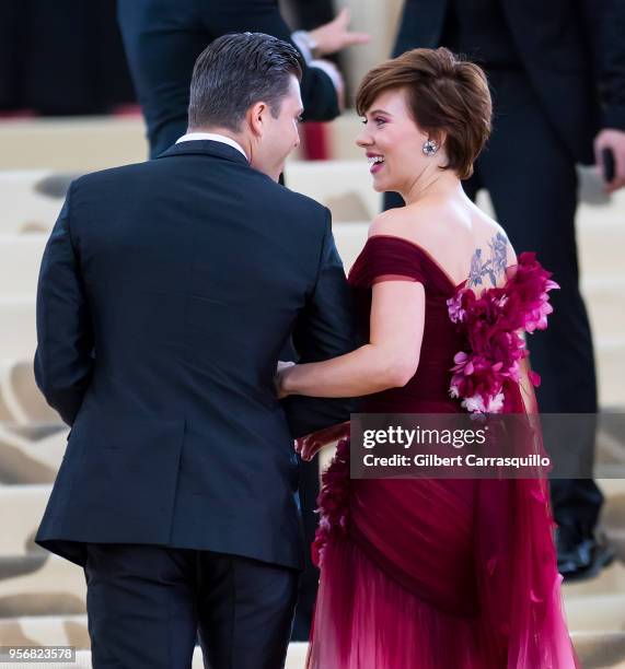 Actors Colin Jost and Scarlett Johansson are seen arriving to the Heavenly Bodies: Fashion & The Catholic Imagination Costume Institute Gala at The...