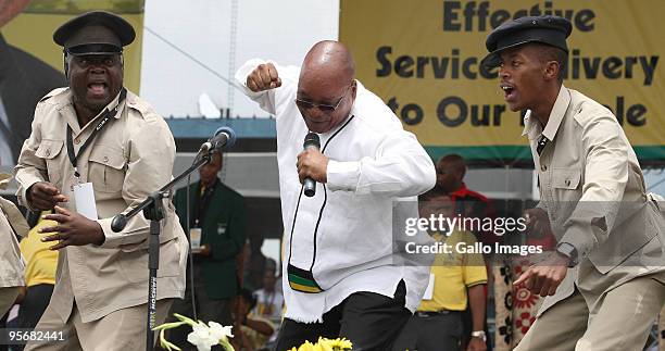 South Africa President Jacob Zuma sings and dances during the African National Congress' 98th anniversary celebrations held at the GWK Park Stadium...