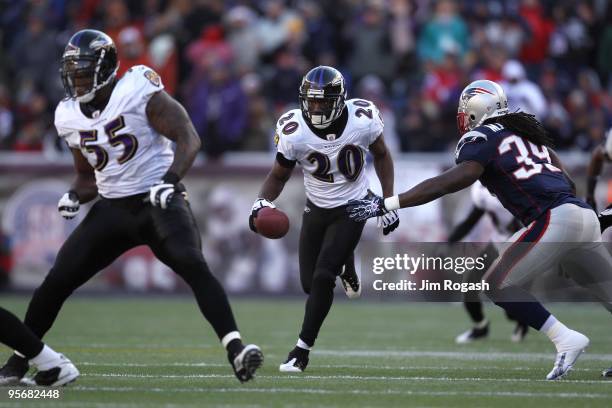 Ed Reed of the Baltimore Ravens intercepts a pass in the first quarter against the New England Patriots during the 2010 AFC wild-card playoff game at...