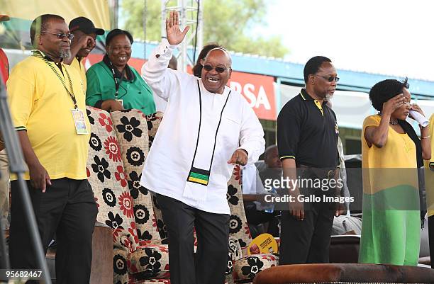 South Africa President Jacob Zuma sings and dances during the African National Congress' 98th anniversary celebrations held at the GWK Park Stadium...