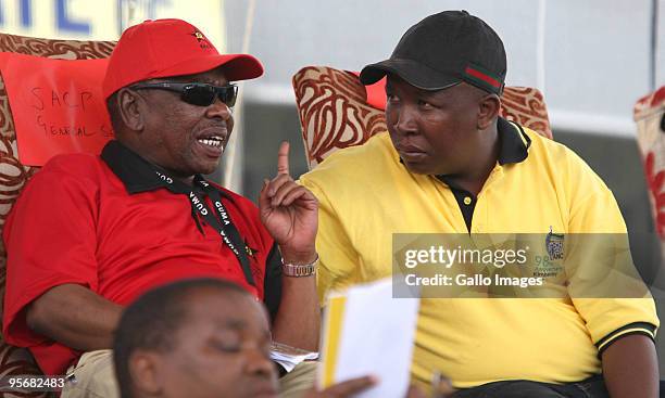 Youth League president Julius Malema and Blade Nzimande share a conversation during the African National Congress' 98th anniversary celebrations held...