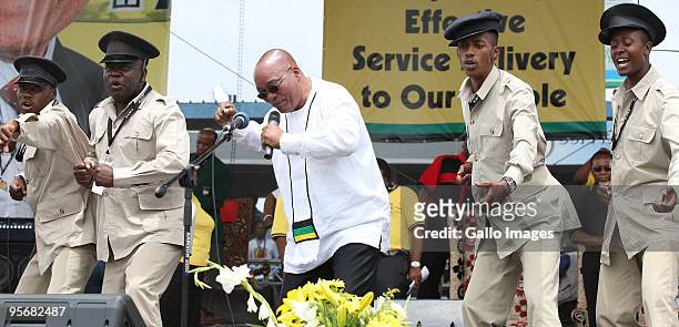 South Africa President Jacob Zuma sings and dances during the African National Congress' 98th anniversary celebrations held at the GWK Park Stadium...