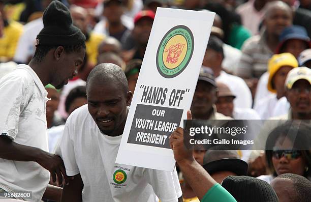 Supporters cheer during the African National Congress' 98th anniversary celebrations held at the GWK Park Stadium on Saturday, 10 January 2010 in...