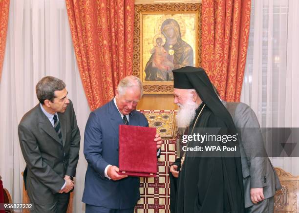 Prince Charles, The Prince of Wales receives a gift of an Icon of the Virgin Mary from His Beatitude Archbishop Ieronymos II of Athens and All Greece...