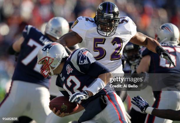 Tom Brady of the New England Patriots atempts to duck the pass rush of Ray Lewis of the Baltimore Ravens during the 2010 AFC wild-card playoff game...