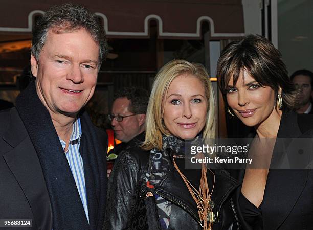 Rick Hilton, Kathy Hilton and actress Lisa Rinna attend the Audi Golden Globes Celebration with Nominee Anna Paquin at the Sunset Tower Hotel on...