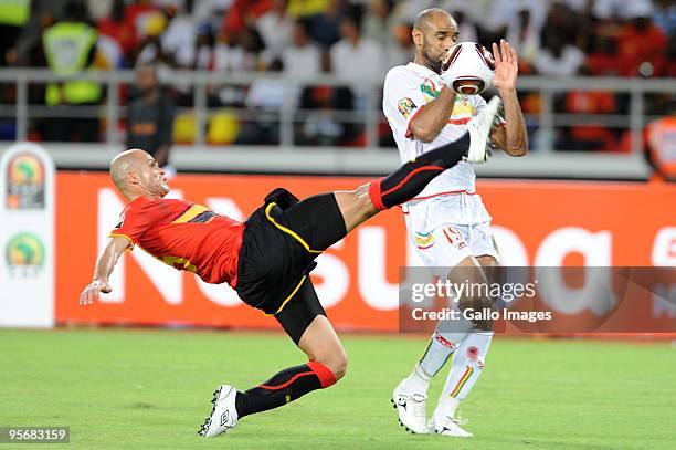 Angola's captain Kali and Mali's Frederic Kanoute compete during the Group A African Nations Cup match between Angola and Mali, at the November 11...