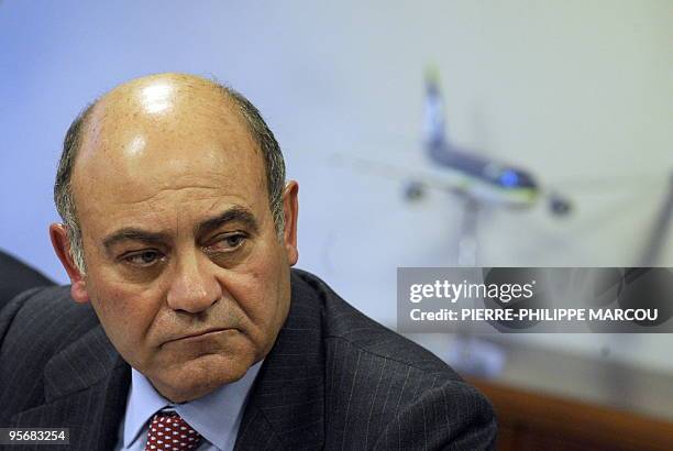 Of Spanish airlines Air Comet Gerardo Diaz Ferran listens during a press conference in Madrid, on December 23, 2009. Air Comet, which mainly operates...