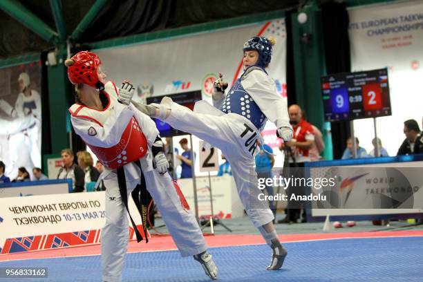 Merve Dincel of Turkey in action against Dominika Hronova of Czech Republic in the women's 49 kg category of the WTE European Taekwondo Championships...