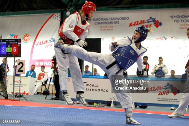 Merve Dincel of Turkey in action against Dominika Hronova of Czech Republic in the women's 49 kg category of the WTE European Taekwondo Championships...