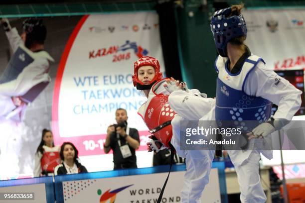 Zeliha Agris of Turkey in action against Vanja Stankovic of Serbia in the women's 49 kg category of the WTE European Taekwondo Championships 2018 at...