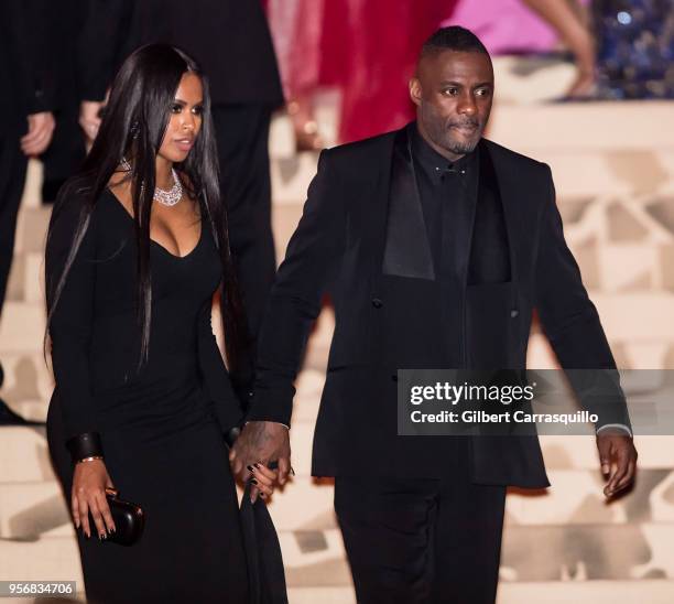 Sabrina Dhowre and actor Idris Elba are seen leaving the Heavenly Bodies: Fashion & The Catholic Imagination Costume Institute Gala at The...