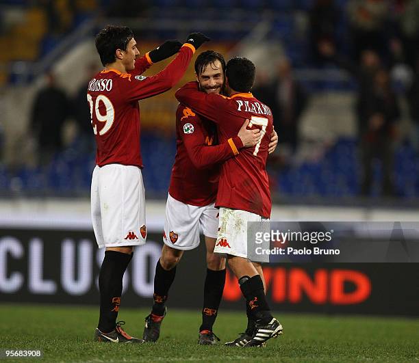 Nicolas Burdisso , Marco Casetti and David Pizarro celebrate the victory after the Serie A match between Roma and Chievo at Stadio Olimpico on...