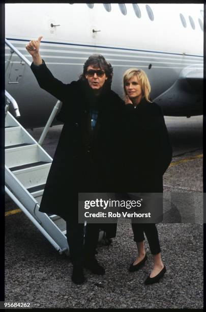 Paul McCartney and Linda McCartney arrive at Zestienhoven Airport in Rotterdam, Holland on November 07 1989