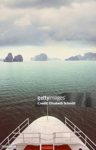 view over halong bay and parts of passenger ship - quang ninh stock pictures, royalty-free photos & images